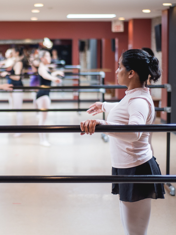Adult ballet student warming up